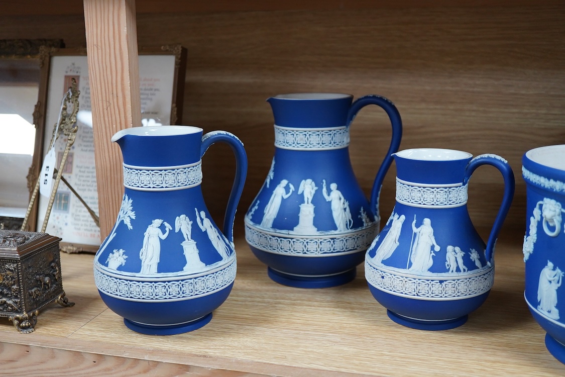 Three 19th century Wedgwood graduated jasper ware jugs and a jardiniere- 16.5cm